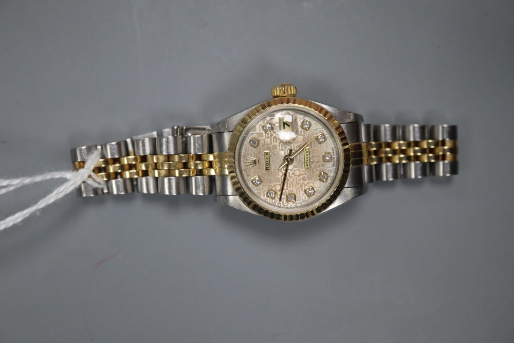 A ladys steel and yellow metal Rolex Datejust wrist watch with diamond set after market? dial, with box and certificate.